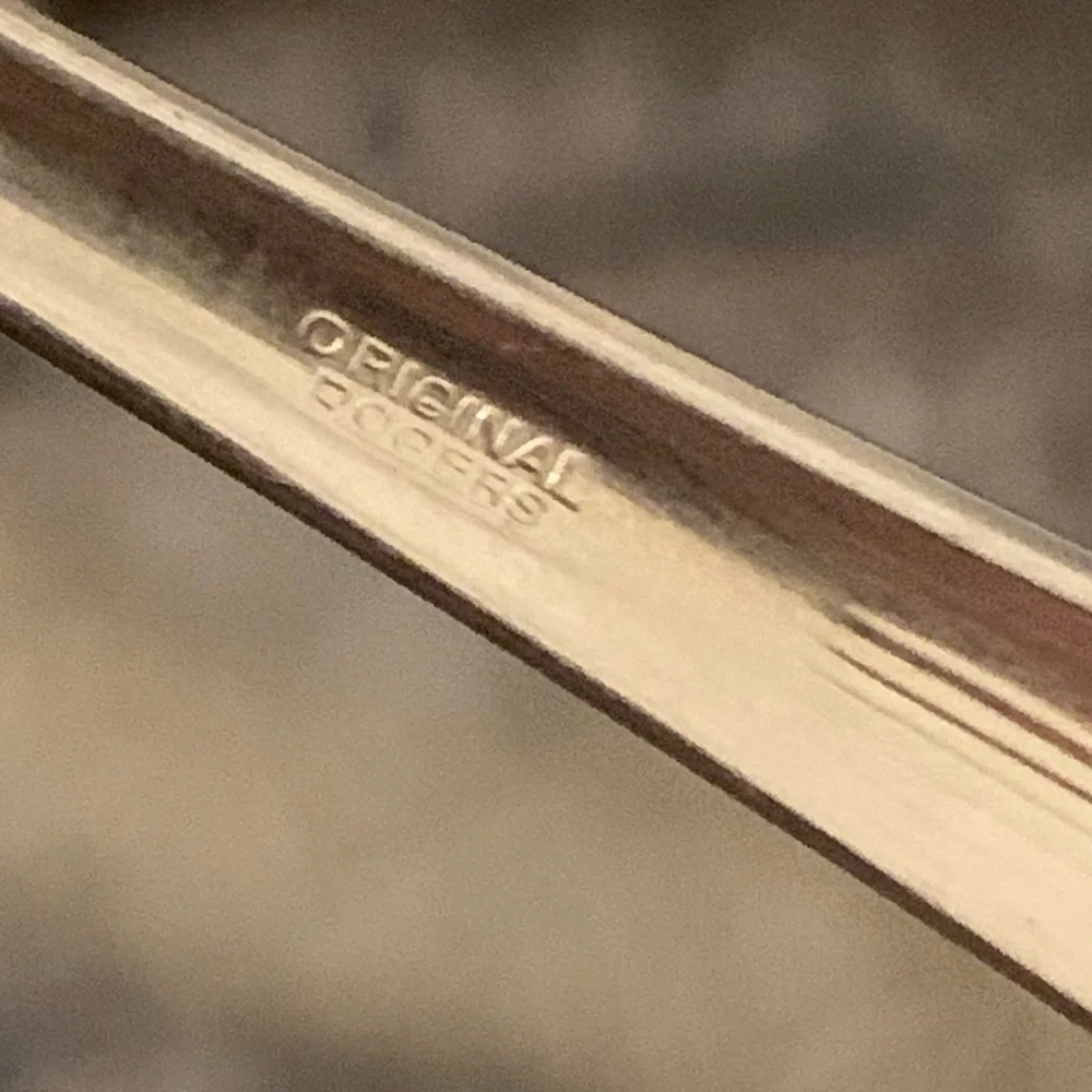 Vintage silver spreader knives